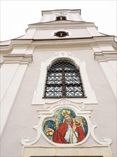 Church tower, mosaic on the church facade, St Nicholas, Roman Catholic parish church of St