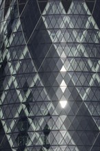 The Gherkin skyscraper building close up of window details, City of London, England, United