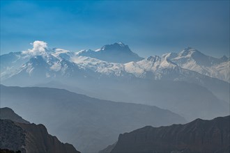 Desert mountain scenery with the Annapurna mountain range in the background, Kingdom of Mustang,