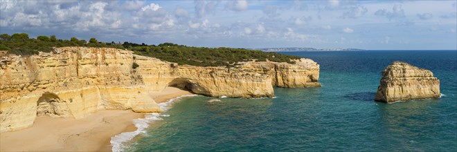 Beach section with rocky coast at the Algarve, summer holiday, weather, sunny, Atlantic, panorama,