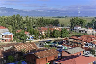 Aerial view of a town with traditional houses surrounded by nature, Pindaya, Inle Lake, Myanmar,