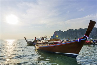 Longtail boat for transporting tourists, water taxi, taxi boat, ferry, ferry boat, fishing boat,