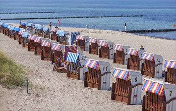 Colourful, lockable beach chairs on the Baltic Sea, Kuehlungsborn, Mecklenburg-Vorpommern, Germany,
