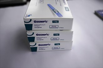 Stack of Ozempic medication packages on a table, for diabetes 2 patients, Stuttgart,