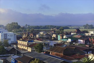 View of a town with traditional buildings at dawn, Pindaya, Inle Lake, Myanmar, Asia