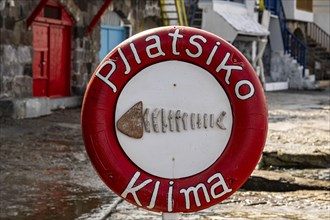 Billboard in the shape of a lifebuoy, climate, Milos, Cyclades, Greece, Europe