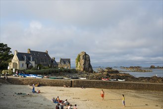 Houses and granite rocks on the beach, Plougrescant, Cote de Granit Rose, Cotes d'Armor, Brittany,