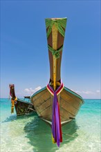 Longtail boat, fishing boat, wooden boat, decorated, tradition, traditional, faith, cloth,