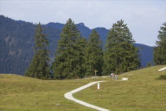 Hiking trail Philosophenwegwith hikers, autumn, Garmisch-Partenkirchen, Upper Bavaria, Bavaria,