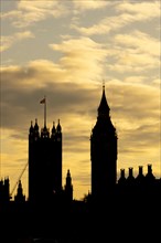 Big Ben or The Elizabeth Tower clock tower of the Palace of Westminster at sunset, City of London,