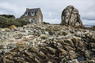Houses and granite rocks, Plougrescant, Cote de Granit Rose, Cotes d'Armor, Brittany, France,