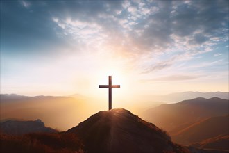 Silhouette of religious Christian cross on mountain top illuminated with sunlight. KI generiert,