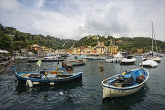 Village with colourful houses and harbour by the sea, Portofino, Province of Genoa, Liguria, Italy,