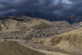 Little village in a colourful eroded mountain desert, Kingdom of Mustang, Nepal, Asia