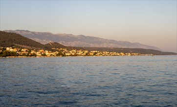 Evening light over a bay near the town of Rab, panoramic shot, island of Rab, Kvarner Gulf Bay,