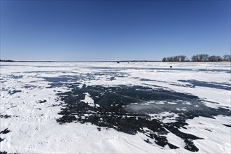 Winter, snow drifts on frozen riverscape, Saint Lawrence River, Province of Quebec, Canada, North