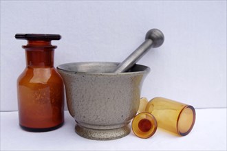 Mortar, pestle, pharmacy, antique, cast iron, glass jar, amber glass, This old pill mortar made of