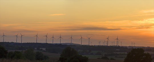 Wind turbines in the sunset, Schoenberg, Mecklenburg-Vorpommern, Germany, Europe