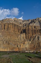 Eroded rock formations behind Chhusang village, Kingdom of Mustang, Nepal, Asia