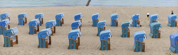 Blue beach chairs on the Baltic Sea, Kuehlungsborn, Mecklenburg-Vorpommern, Germany, Europe