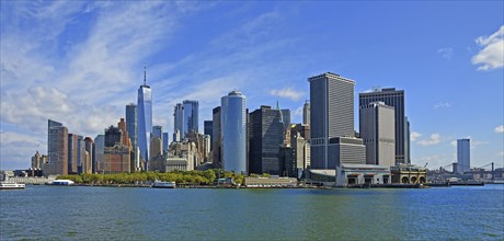 Skyline with skyscrapers in the Financial District, Battery Park in the foreground, One World Trade