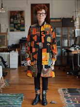 Woman in eclectic, vibrant clothing stands in a home environment, AI generated