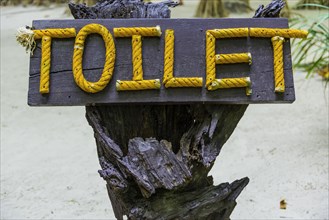 Signpost to toilet, hint, sign, international, language, word, WC, public, bathroom, hygiene, loo,