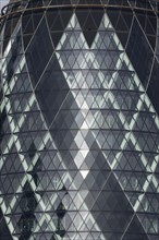 The Gherkin skyscraper building close up of window details, City of London, England, United