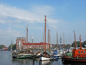 Boats, ships, town hall, Emden harbour, East Frisia, Germany, Europe