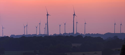 Wind turbines in the sunset, Schoenberg, Mecklenburg-Vorpommern, Germany, Europe