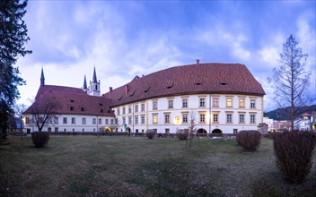 Goess Abbey at the blue hour, former monastery of the Benedictine nuns, panoramic view, Leoben,