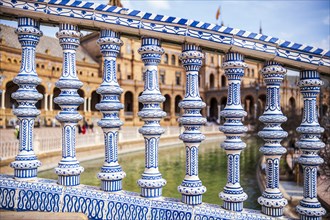 Close up of spanish tiles called azulejos on handrail at Plaza de Espana, Seville, Spain, Europe