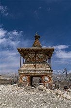 Colourfully painted Buddhist stupa, Tsarang, Kingdom of Mustang, Nepal, Asia