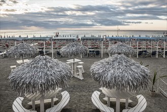 Empty beach and beach loungers, sunrise, Spotorno, Riviera di Ponente, Liguria, Italy, Europe