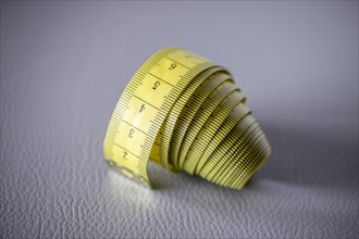 Yellow tape measure, roll