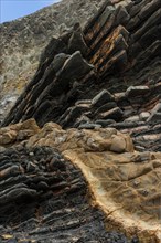 Rock layers on the Portuguese Atlantic coast, geology, grey, beige, nature, natural stone, rock,