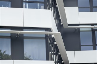 Close-up of a window area of modern architecture with white frames