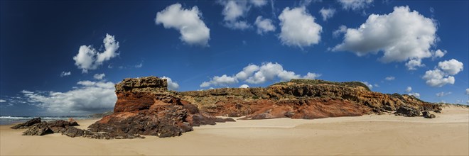 Rocky beach landscape in the Algarve, blue sky, beach, rocks, red, rock, geology, travel, beach