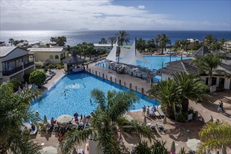 View of garden and pool facilities by the Atlantic Ocean, Hotel H10 Rubicon Palace, Lanzarote,