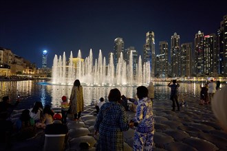 The Dubai Fountain water features on Lake Burj Khalifa. Dubai, United Arab Emirates, Asia