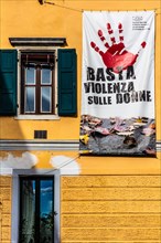 Wall poster No more violence against woman, Cividale del Friuli, city with historical treasures,