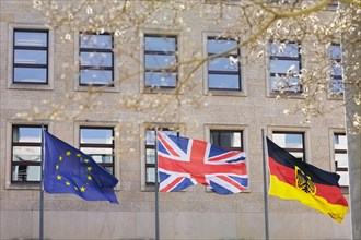 The flags of Great Britain, Germany and the European Union wave in the wind. Berlin, 07.03.2024.
