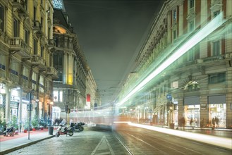 Tram in Long Exposure at Night in Milan, Lombardy, Italy, Europe