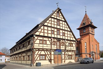 Historic Ochsenhof former barn and current museum and municipal gymnasium, red brick building,