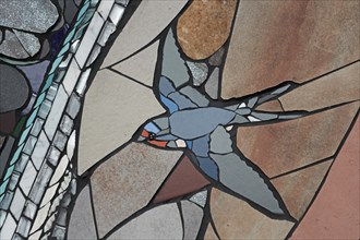 Wall mosaic with barn swallow in flight by Isidora Paz Lopez 2019, one, brown, grey, bird figure,