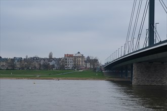 View over the Rhine with bridge, behind Oberkassel, Duesseldorf, Germany, Europe