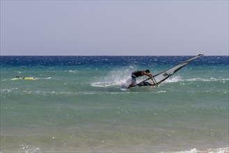Surfer at Playa de Sotavento, Costa Calma, Fuerteventura, Canary Island, Spain, Europe