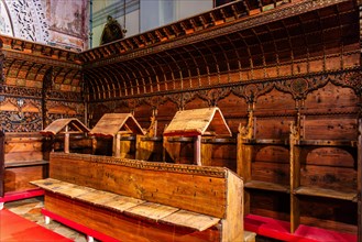 Wooden choir of the Tempietto Lombardo with medieval, Byzantine-influenced stucco decorations,