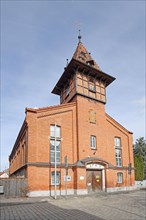 Municipal gymnasium, red brick building with spire, tower, Bad Windsheim, Middle Franconia,