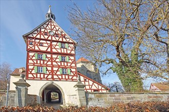 Historic gate tower built in 1545 and landmark, gatehouse, half-timbered house, Burgbernheim,